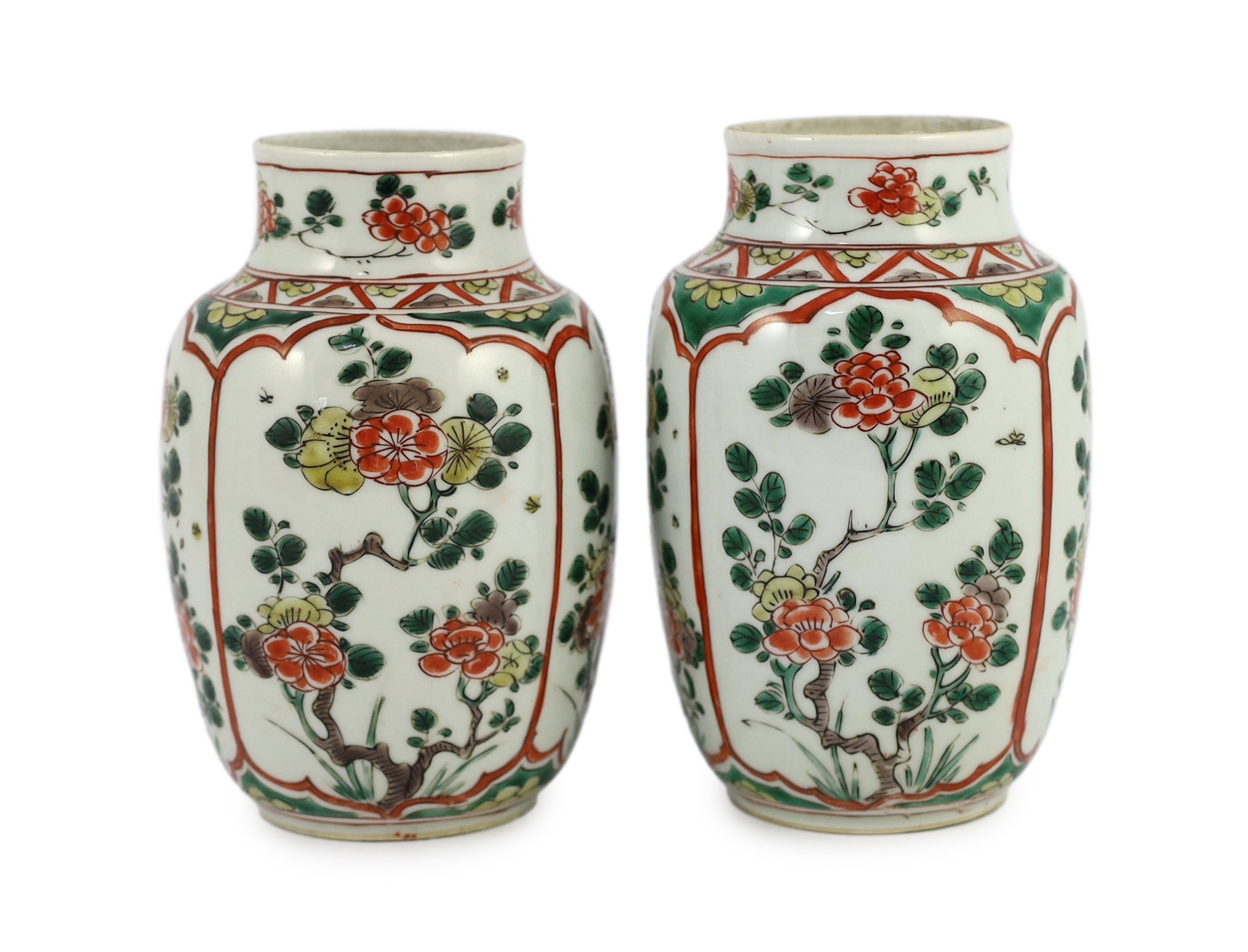 A pair of Chinese famille verte small jars, Kangxi period, 15.5cm high, rim crack